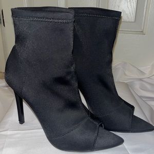 Black stiletto heels with pointed tip